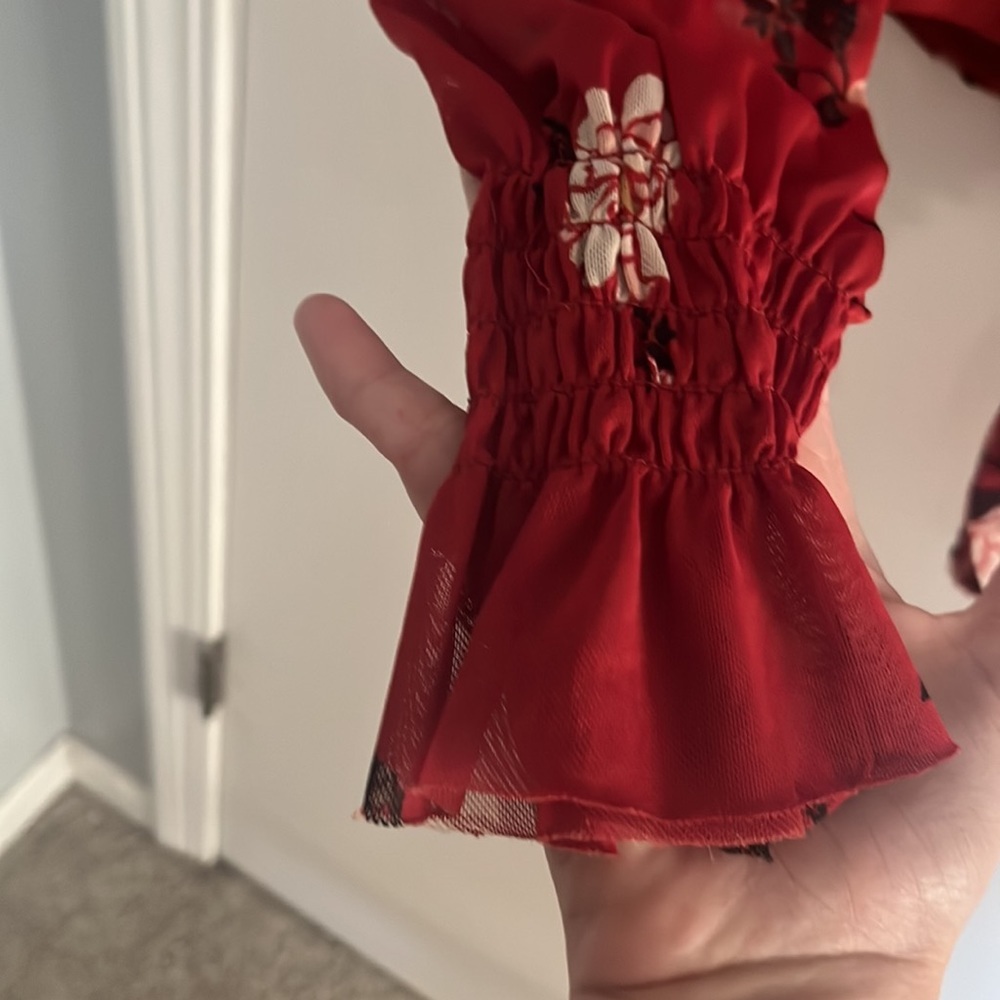 Red flowered long sleeve mock neck top. - Picture 2 of 4